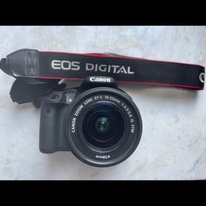 Brand new Canon Rebel T5i with 58mm lens comes with box and strap.